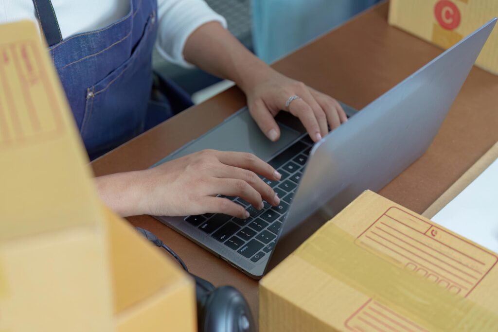 small business owner updating their Google Business Profile photos on a laptop